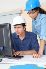 Students engineers working on project