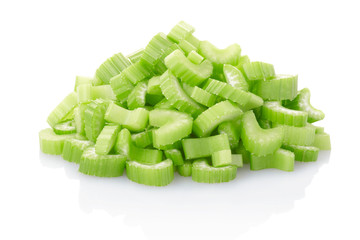 Celery pieces heap isolated on white, clipping path included