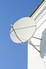 satellite antenna on a house facade