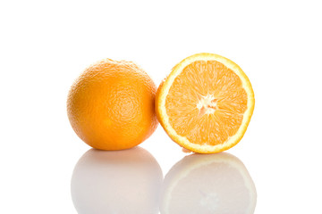 Two perfectly fresh oranges