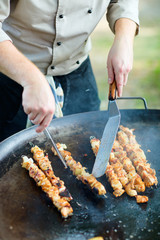 Chef cooking meat