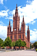 Fototapeta premium famous Markt Kirche in Wiesbaden, a brick building in neo-Gothic