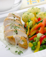 Chicken breast with vegetables and sauce