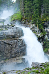 Alps waterfall summer view