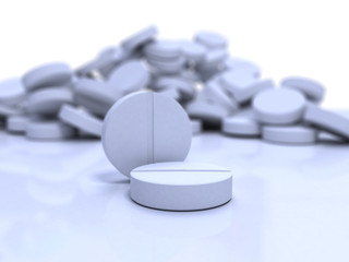 Obraz na płótnie Canvas close-up medical pills on blue surface