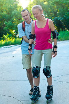 Sport skates training . Young couple