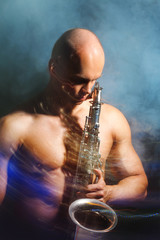 Fototapeta na wymiar Man playing sax