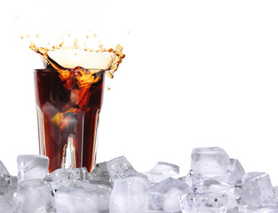 Ice splashing drink with ice cubes, isolated on white background
