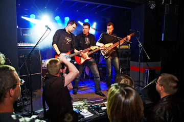 rock band on the stage - obrazy, fototapety, plakaty