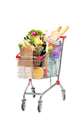 A studio shot of a shopping bag full with healthy groceries