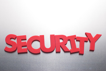 security word on metal background