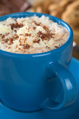 Hot chocolate with whipped cream and chocolate shavings