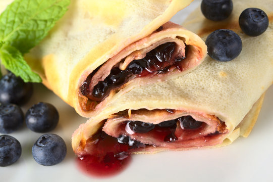 Rolled Pancakes Filled With Blueberry Jam