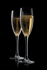 A glass of champagne, isolated on a black  background.