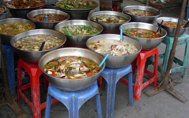 Various prepared Thai food for sale at market