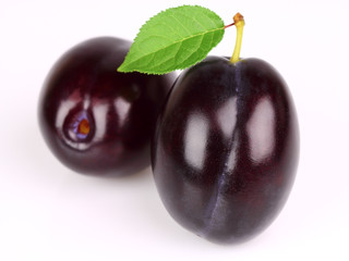 Sweet plums with leaves