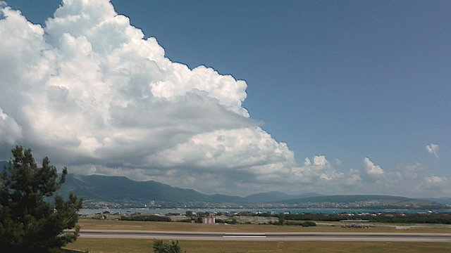 Clouds swirl over the mountains