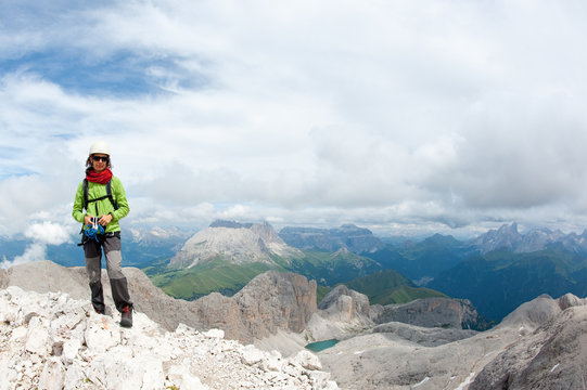 Mountain scenery with rock climber. Dolomites, Italy.