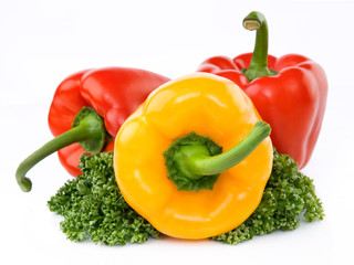 three fresh sweet pepper isolated on white background