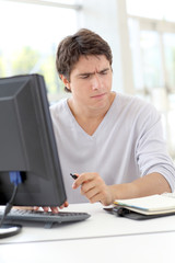 Office worker with thoughtful look