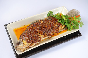 fried fish with fresh herbs