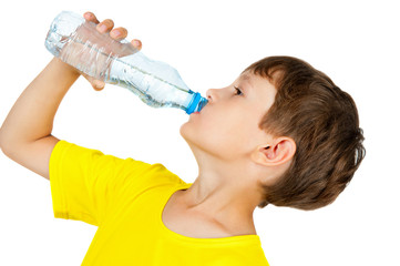 boy drinks water from a bottle