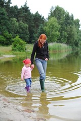 mother, baby, walk in a water