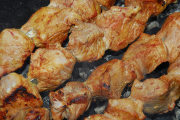 Pork pieces baked on a brazier