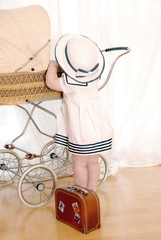 Child with doll's pram