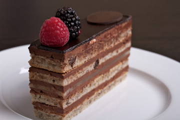 Chocolate cake with a raspberry and blackberry