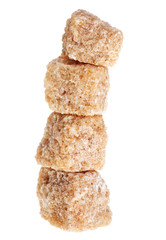 Some brown lump cane sugar cubes, isolated on white