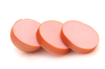 three appetizer sausages on white background