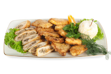 Appetizer of meat with lettuce, pepper and vegetables