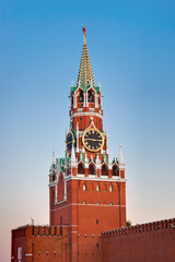 Fototapeta na wymiar Spasskaya tower in Kremlin (Moscow) at sunset