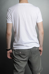 Obraz premium back of young man posing in studio