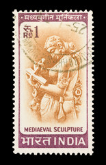 mail stamp printed in India featuring a medieval sculpture - 34119961