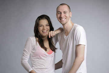 beautiful happy teens smiling in studio