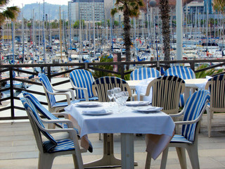restaurant on a terrace in Port Olimpic, barcelona, spain