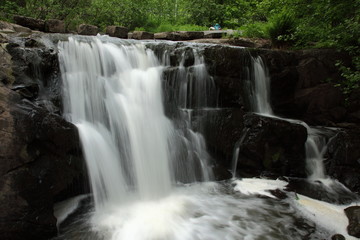 Fototapeta na wymiar Waterfall in a park