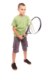 Child playing tennis