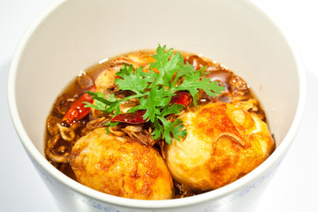 Fried eggs topped with sweet sauce