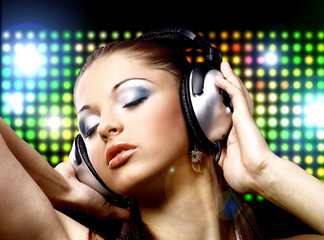 Portrait of a young girl in headphones