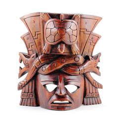 Hand carved Mayan mask isolated on a white background.
