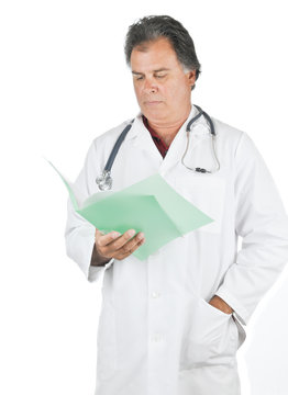 Doctor reading patient file