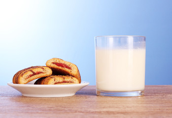 cookies with milk on blue background