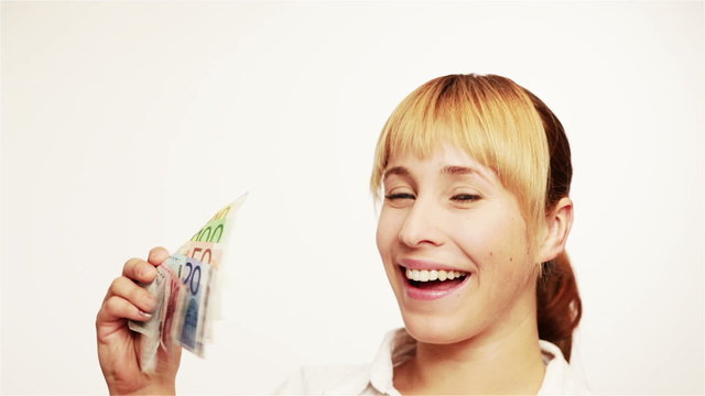 Happy woman with money fan