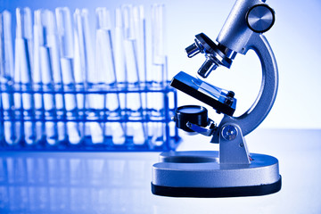 microscope and laboratory glassware