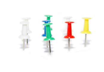 red, blue, green and white pushpins