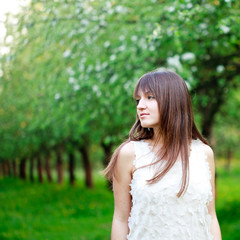 Naklejka premium Girl in the garden