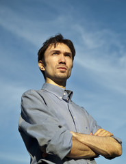 man on blue sky background